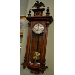A walnut Vienna type double weight driven wall clock, dial stamped 'GB' for Gustav Becker