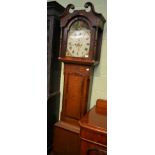 An oak and mahogany eight day longcase clock, arched painted dial, early 19th century