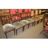 Four late Victorian mahogany inlaid salon chairs together with three other Victorian dining