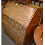 An early 19th century oak bureau