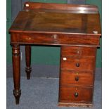 A clerks desk with a pedestal base and two turned legs