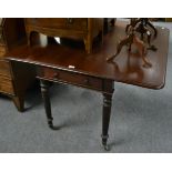 An early 19th century mahogany drop leaf table with one single central drawer