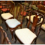 A pair of early 18th century mahogany dining chairs, with another similar (3)