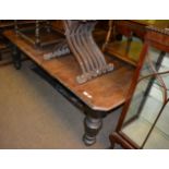 A Victorian extending dining table (with two extra leaves)