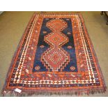 Gabbeh Rug, South West Iran, the indigo field with three stepped medallions framed by multiple