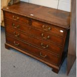A mahogany mule chest in the form of a chest of drawers (faux drawers)