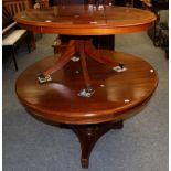 A mahogany circular breakfast table and an oval shaped reproduction coffee table (2)