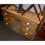 A pine low dresser comprising six drawers
