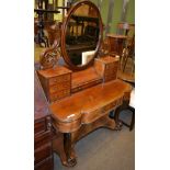 A Duchess dressing table 160cm high, 118cm by 51cm.