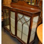 An early 20th century mahogany glazed display cabinet