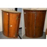 Two early 19th century oak and mahogany corner cupboards