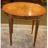 A reproduction Louis XVI oval marquetry table