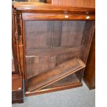 A 19th century and later mahogany open bookcase