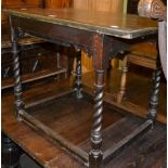 An 18th century and later oak side table