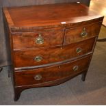 A 19th century mahogany bow fronted chest of drawers comprising two long drawers, with two shorter