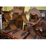 A pair of 20th century carved alter chairs