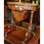 A Victorian burr walnut veneered inlaid sewing table