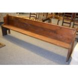 A large oak pew