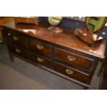 An oak low dresser comprising six drawers, 18th century and later