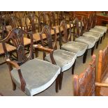 A set of eight Hepplewhite style mahogany shield back dining chairs including two carvers,