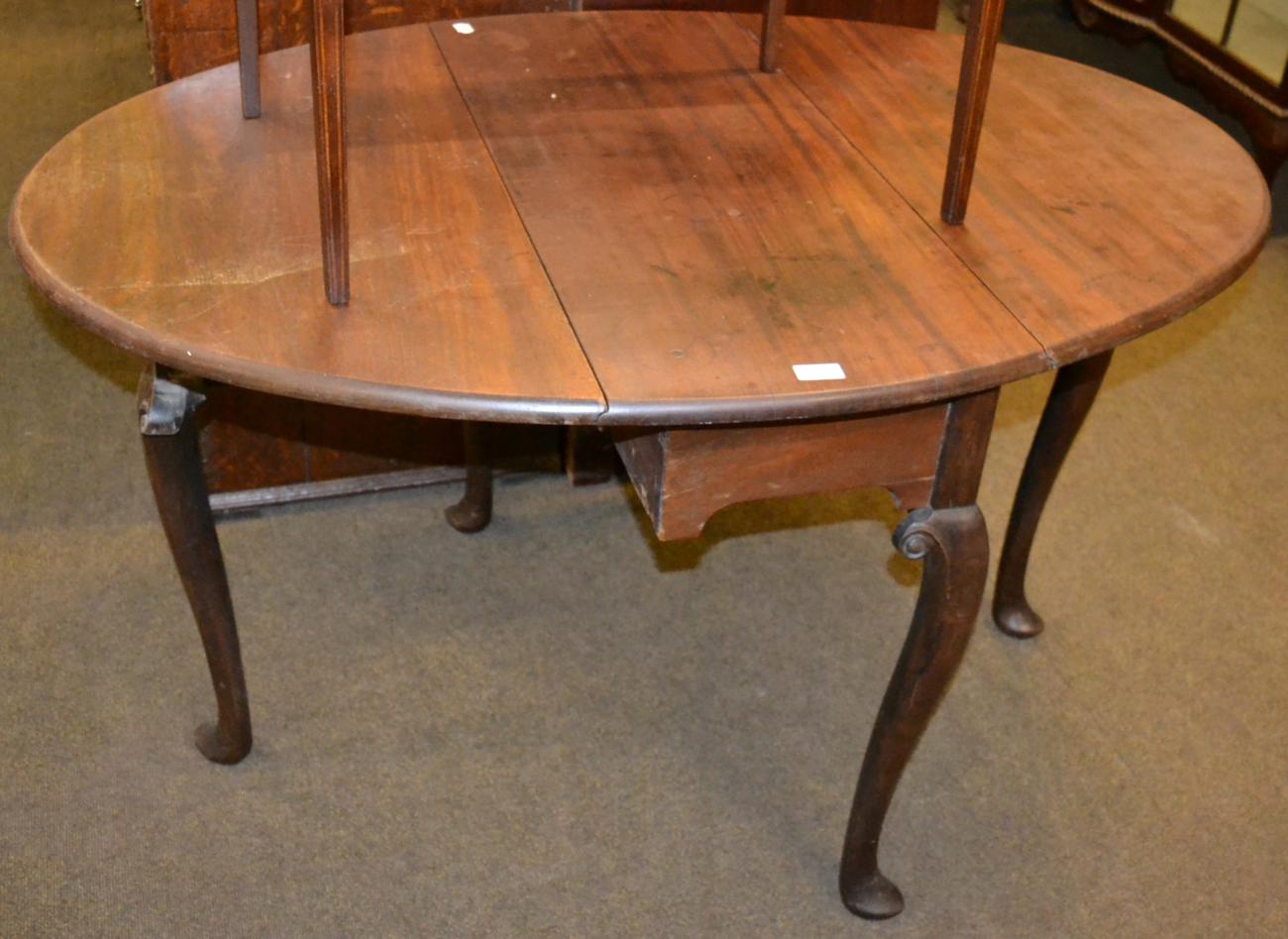 An early 19th century mahogany drop leaf gateleg table