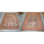 Heriz rug, Iranian Azerbaijan, the indigo field with three medallions enclosed by madder borders,