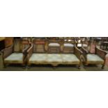 A Chinoiserie three piece bergere suite