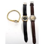 An Omega 9 carat gold cased lady's wristwatch with flexible bracelet and two others (3)