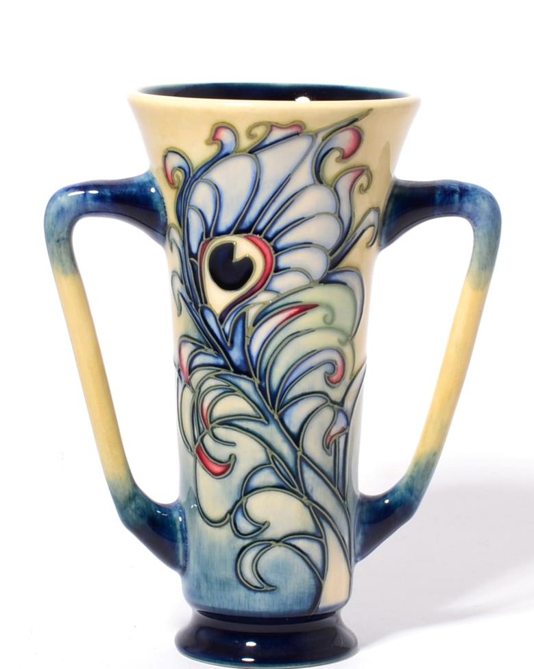 A modern Moorcroft pottery Floating Feathers pattern two handled loving cup, designed by Emma