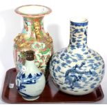 A 19th century Chinese blue and white bottle vase (a.f.), a Canton famille rose vase (a.f.) and a