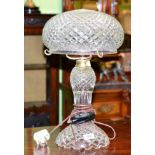 A cut glass mushroom form table lamp