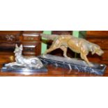 A silvered spelter model of an Alsatian on a marble base and a spelter model of an Irish Setter on a