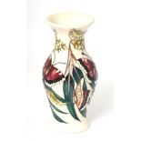 A modern Moorcroft pottery vase by Emma Bossons in one of the Butterfly Collection patterns, with