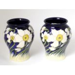 A pair of modern Moorcroft pottery vases by Kerry Goodwin, 44/75 and 68/75, with painted and