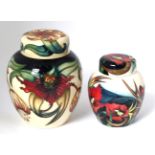 A modern Moorcroft pottery Anna Lily pattern ginger jar and cover by Emma Bossons , with painted and