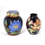 A modern Moorcroft pottery Blue Lotus pattern ginger jar and cover by Rachel Bishop, with painted