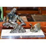 An Art Deco patinated metal figure with swan, on a stepped marble base