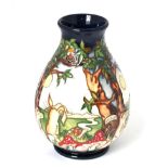 A modern Moorcroft pottery Hare and Tortoise vase by Nicola Slaney, with painted and impressed