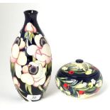 A modern Moorcroft pottery jar and cover by Emma Bossons, 21/40, with painted and impressed marks,