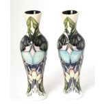A pair of modern Moorcroft pottery Indigo Lace pattern vases by Vicky Lovatt, with painted and