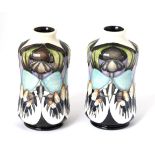 A pair of modern Moorcroft pottery Indigo Lace pattern vases by Vicky Lovatt, with painted and