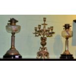 Two Victorian brass oil lamps and a 19th century five light bronze candelabra