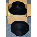 Modern new Christy's London black melusine top hat, labelled size 7.5, 13cm high (2)