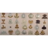 A Collection of Twenty Eight Cap Badges, in brass, bimetal, white metal, bronze and economy