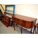 A painted Delft rack together with three modern hanging plate racks and a mahogany sideboard