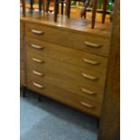 A Danish style five drawer chest of drawers