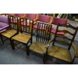 A pair of 19th century country dining chair with solid seats; an oak ladder back armchair with