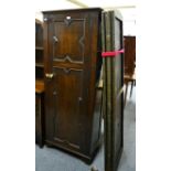 An oak hall cupboard