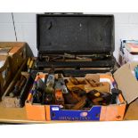 A tool chest, containing a large assortment of woodworking tools including planes, one steel