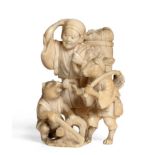 A Japanese Ivory Netsuke, Meiji period, carved with a scene from the Kachi-Kachi Yama legend, signed